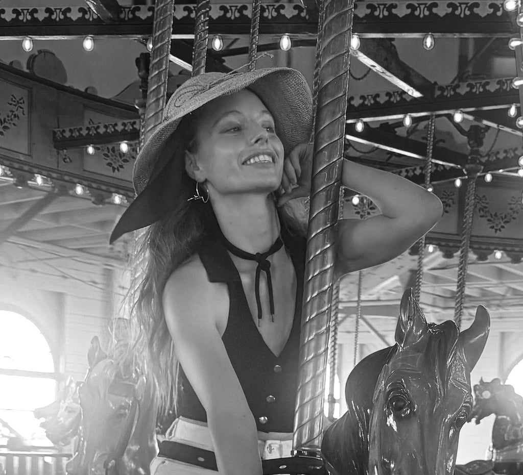 "JOY" (Maria on carousel)